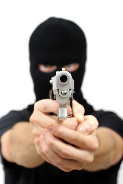 Masked man with gun