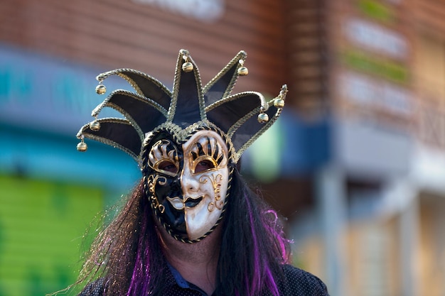 Masked party goer during the carnival of Grand Boucan