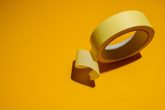 Masking tape on a yellow background