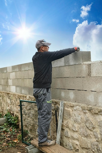 Mason worker bricklayer