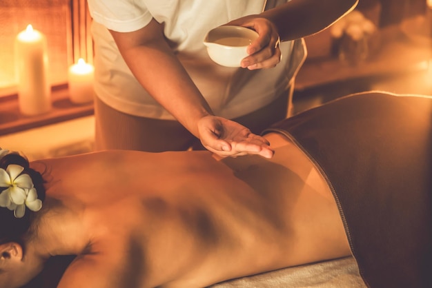 Masseuse prepare oil massage procedure for customer at spa Quiescent