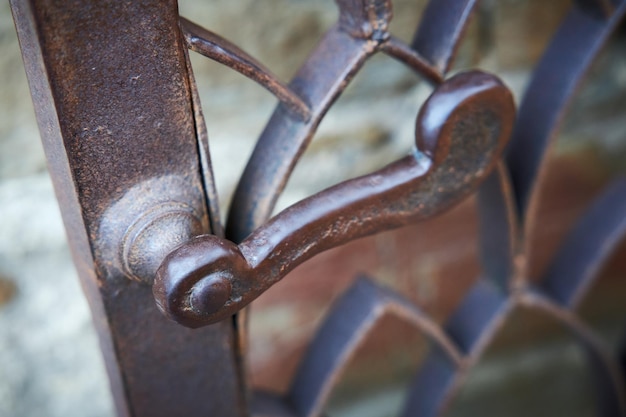 Massive metal iron door handle closeup