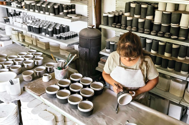 The master ceramist works in her studio