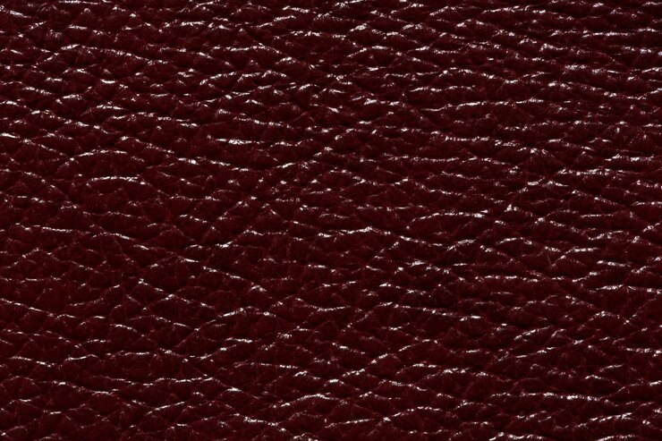 फोटो masterly leather texture in stylish dark red colour