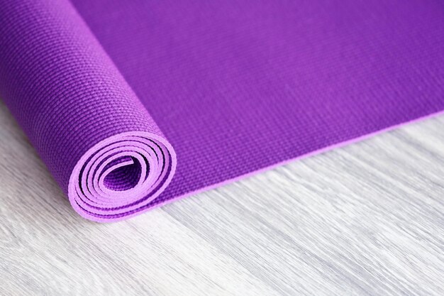 Mat for fitness on wooden floor