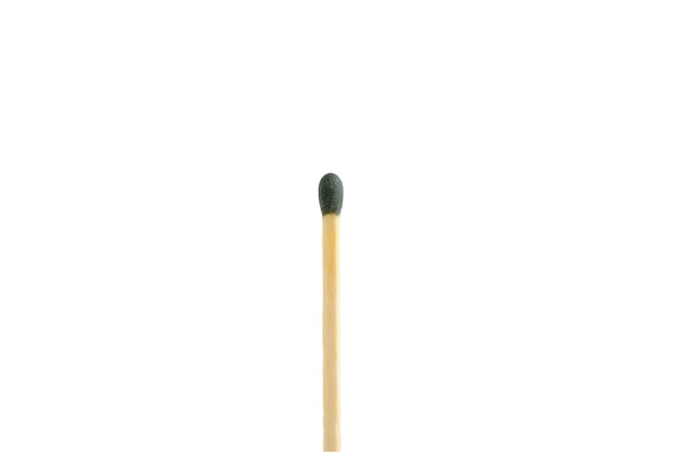 A match with green head on a white background