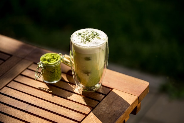 Matcha green tea with ice cubes