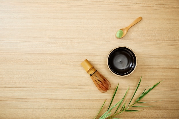 Matcha green tea on wood background