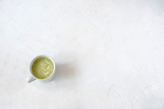 Matcha latte in white cup