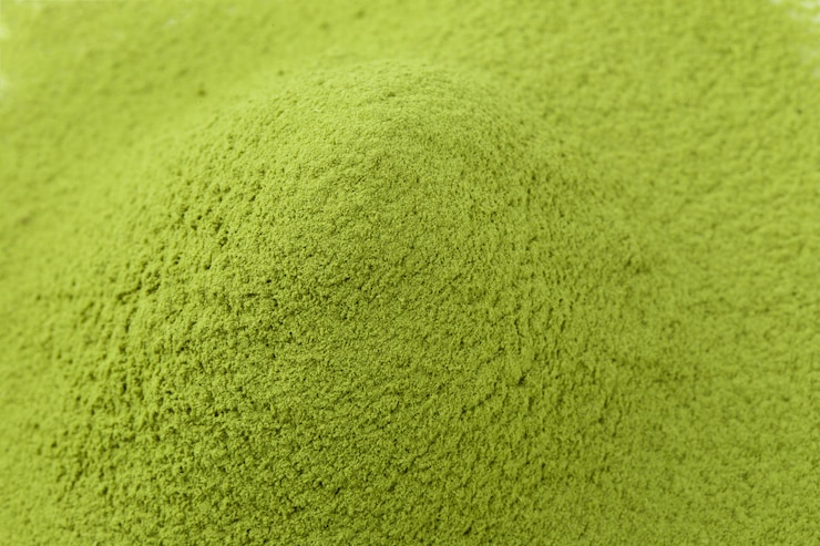 Photo matcha powder green tea isolated on a white background