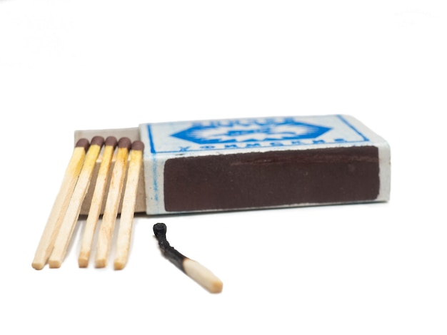 Photo matchbox on a white background matchstick