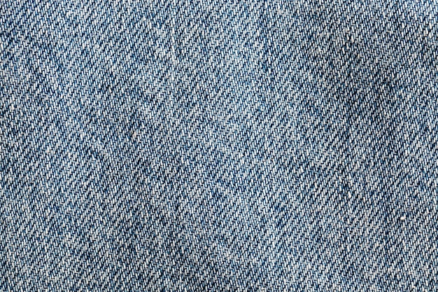Materiaal van blauwe denimstof, details van materiaal van blauwe denimstof