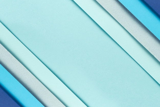 Material design blue background Craft paper sheets are folded in different ways A photo