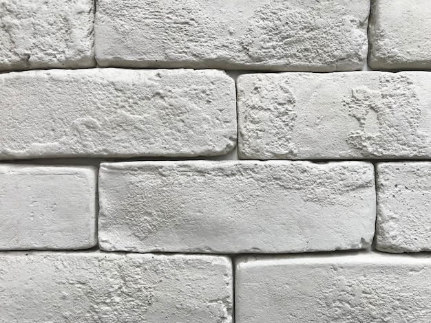 Progettazione dei materiali. modello di muro di mattoni. decorazione della parete domestica. muro di pietra. sfondo sullo sfondo. matrial di pietra