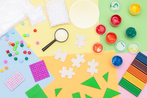Materials used for kids crafts, art, experiments and education. Flat lay. Creativity for kids. Top view