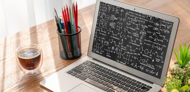 Mathematic equations and modish formula on computer screen showing concept of science and education