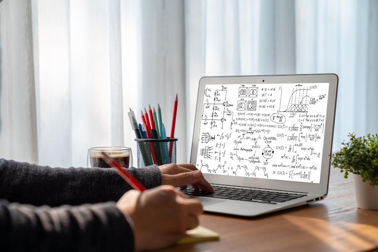 Photo mathematic equations and modish formula on computer screen showing concept of science and education