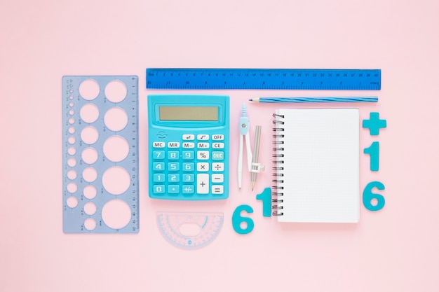 Mathematics with numbers and arranged stationery supplies