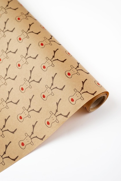 Matte nude wrapping paper for gifts or flowers with drawing of a deer on white background close up