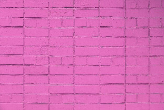 Matte pink painted brick wall full frame flat background and texture