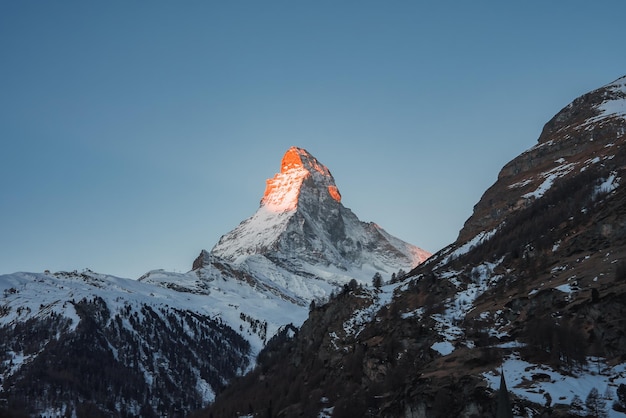 Matterhorn mountain zermatt sunset glow on snowy peak