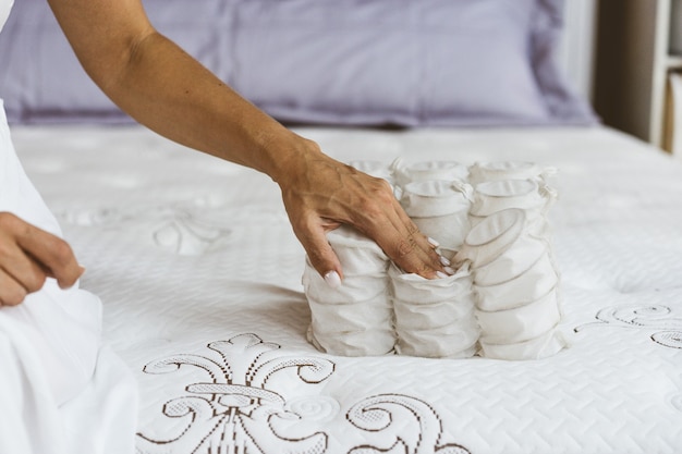 Mattress material in the hands of a woman