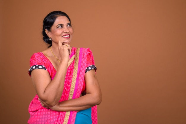 Mature beautiful indian woman wearing sari indian traditional clothes