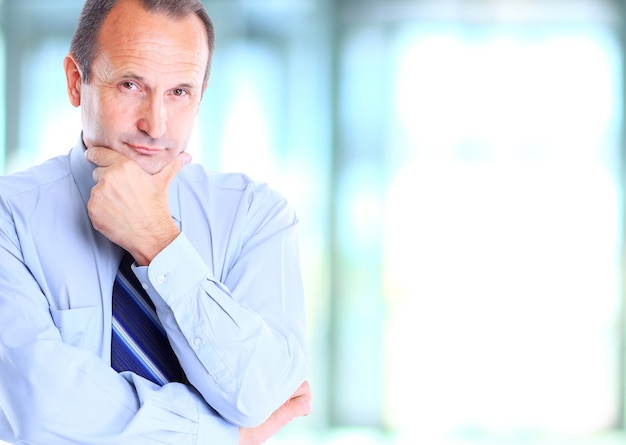 mature business man looking at camera