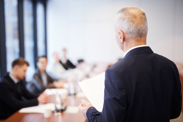 Mature Business Man in Meeting