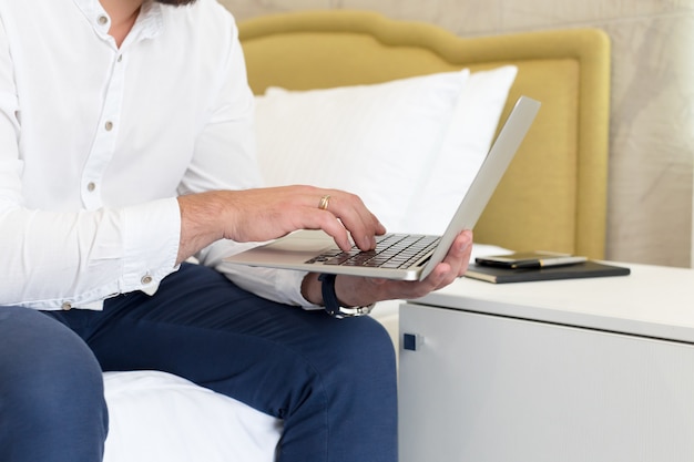 Mature businessman in a hotel room