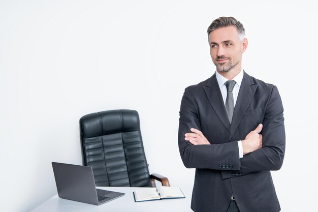 Mature businessperson wear suit in boss office on white background