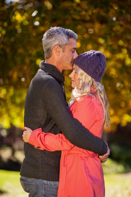 Mature couple hugging at park