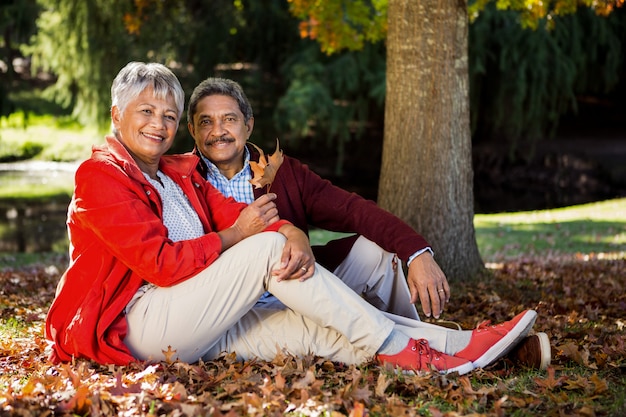 Mature couple at park during autumn