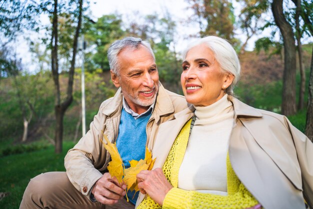 Mature couple portrait in the park