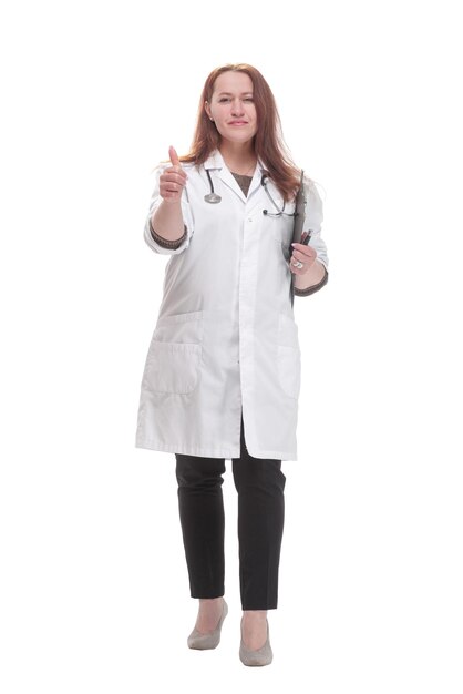 Mature female doctor with clipboard isolated on a white background