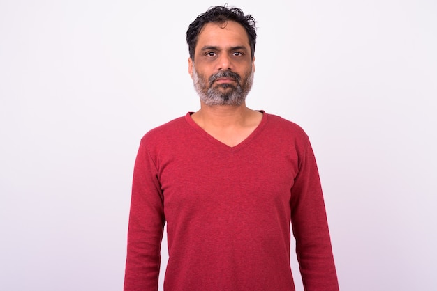 mature handsome bearded Indian man on white