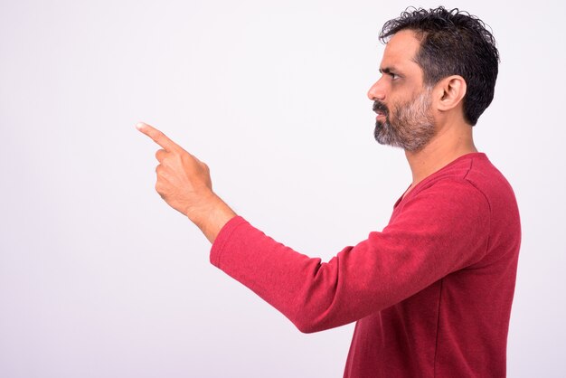 mature handsome bearded Indian man on white