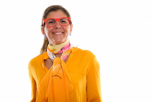 mature happy businesswoman smiling with red eyeglasses