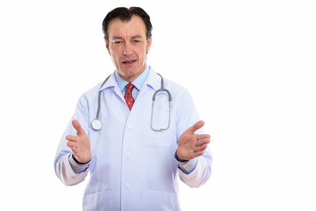 mature happy man doctor presenting something