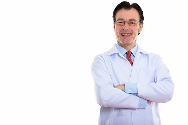 mature happy man doctor smiling and wearing eyeglasses