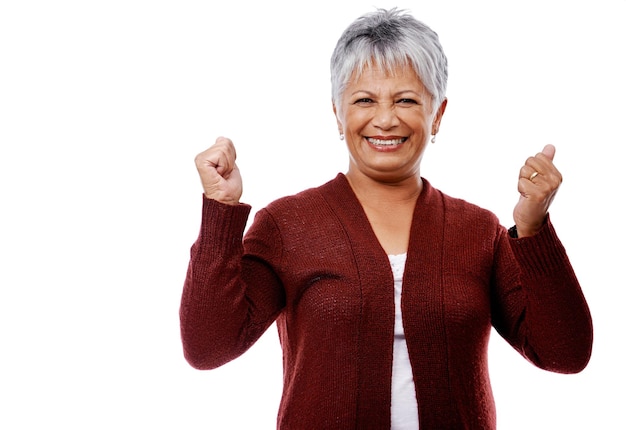 Mature lifestyle Studio shot of a smiling mature woman isolated on white