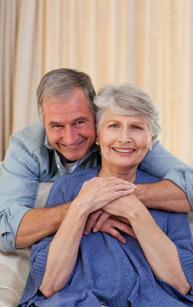 Mature man hugging his wife