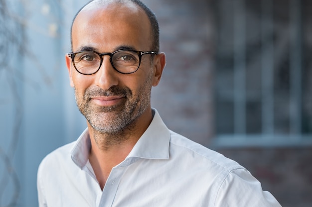 Mature mixed race man smiling