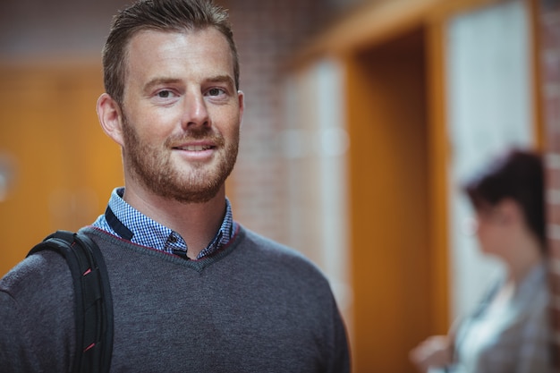 Mature student standing in the corridor