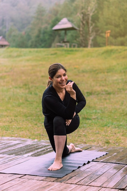 Mature woman exercising and smiling. Healthy lifestyle.