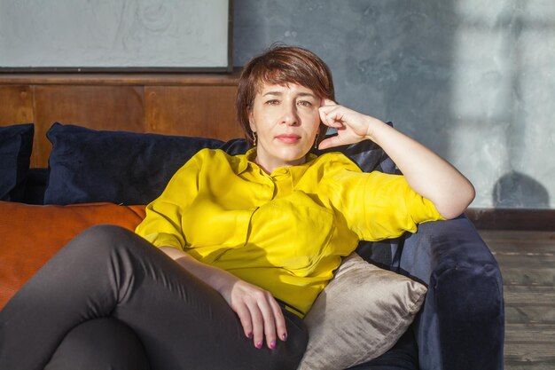 Mature woman resting at home