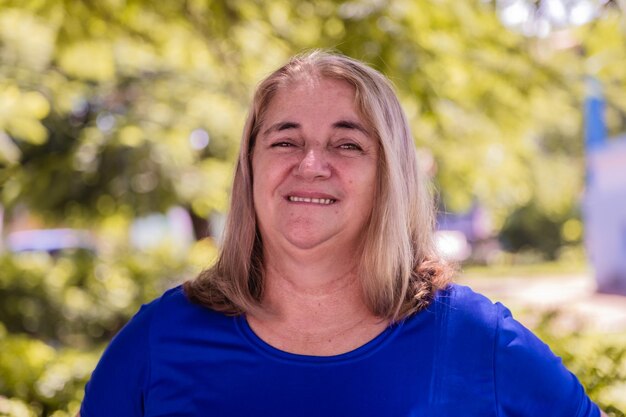 Mature woman smiling in the park