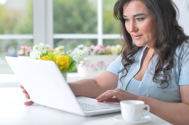 Mature woman with a laptop