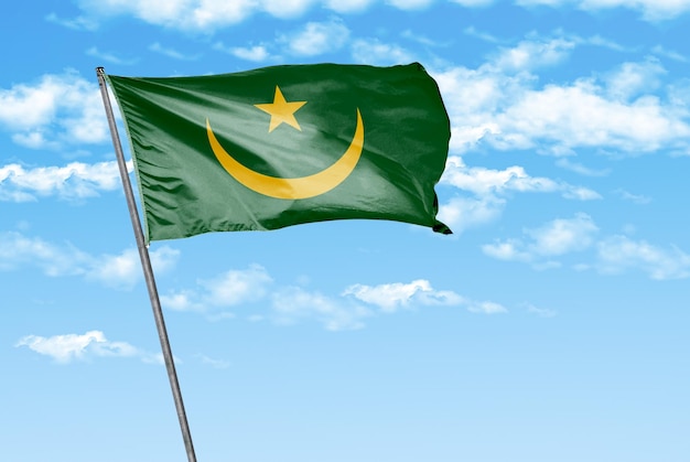 mauritania 3D waving flag on a sky blue with cloud background image