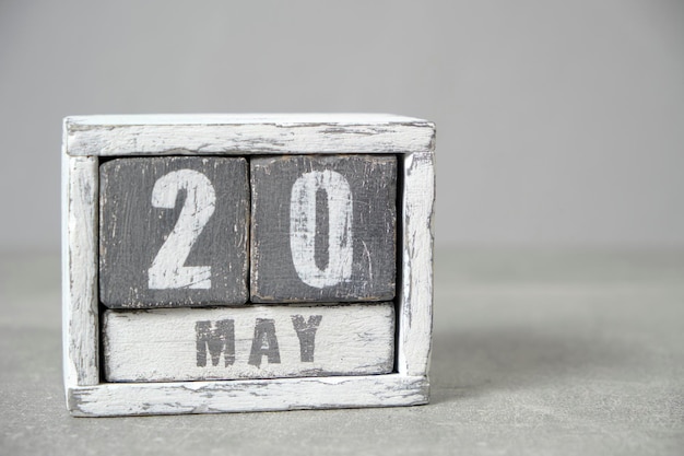 May 20 calendar made wooden cubes gray backgroundWith an empty space for your text